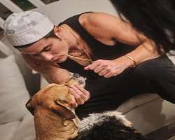 He loves to spend his time with his dog.